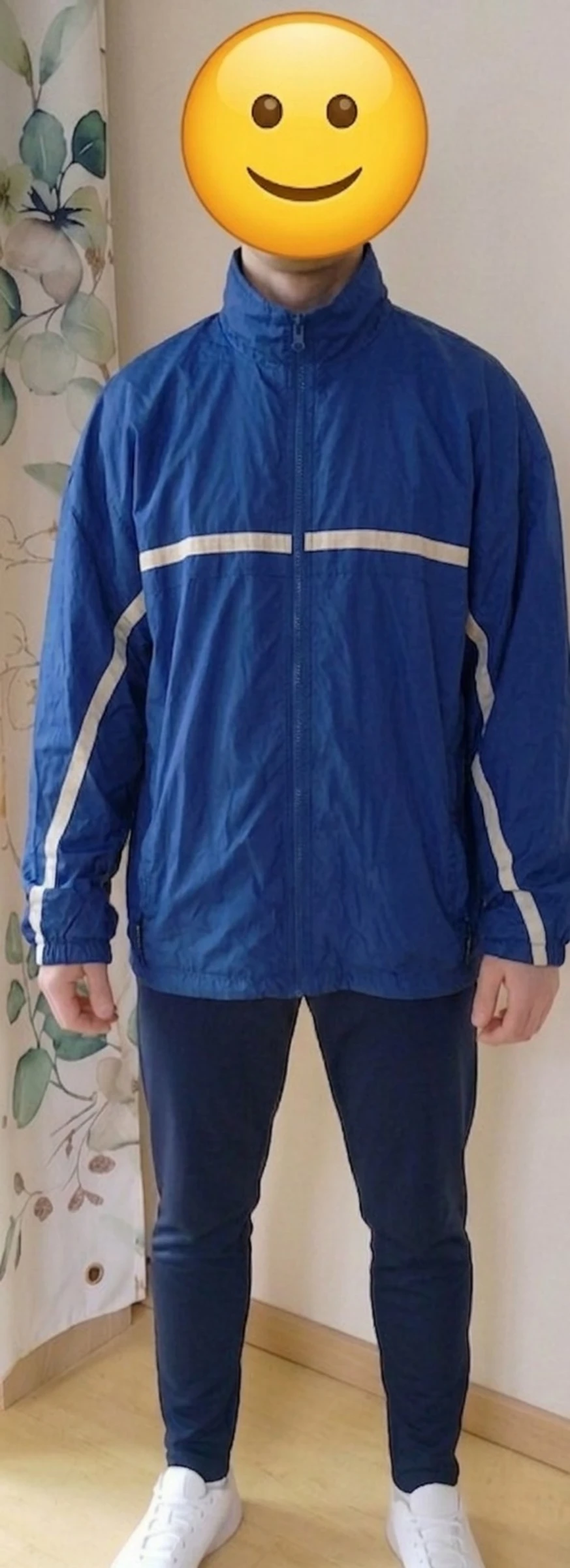 Coupe vent capuche poche intérieure et cordon de serrage